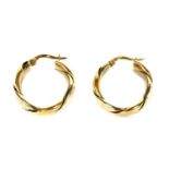 A pair of 9ct white and yellow gold twisted wire hoop earrings,