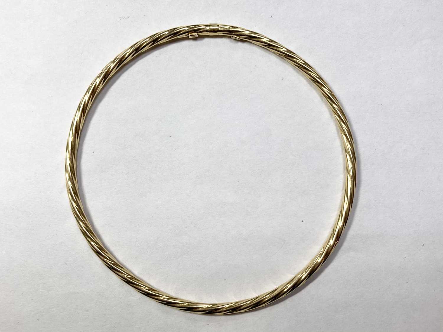 An 18ct gold hollow twisted wire bangle, - Image 2 of 2