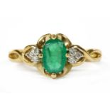 A 9ct gold emerald and diamond ring,