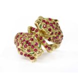 A 9ct gold ruby and emerald set panther ring,