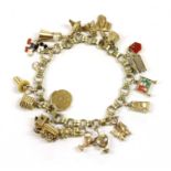 A Continental gold charm bracelet,