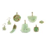 A quantity of gold jade jewellery,