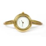 A ladies' gold-plated Gucci quartz bangle watch,