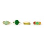 A 14ct gold three stone jade ring,