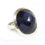 A sterling silver single stone sapphire ring,