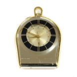A Jaeger-LeCoultre gilt metal folding travel alarm clock,