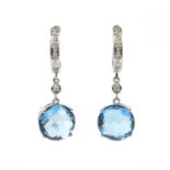 A pair of white gold blue topaz and diamond drop earrings,