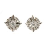 A pair of white gold diamond cluster earrings,