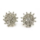 A pair of 9ct gold diamond cluster earrings,