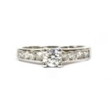 A white gold single stone diamond ring,