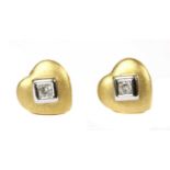 A pair of 18ct gold single stone heart shaped stud earrings,