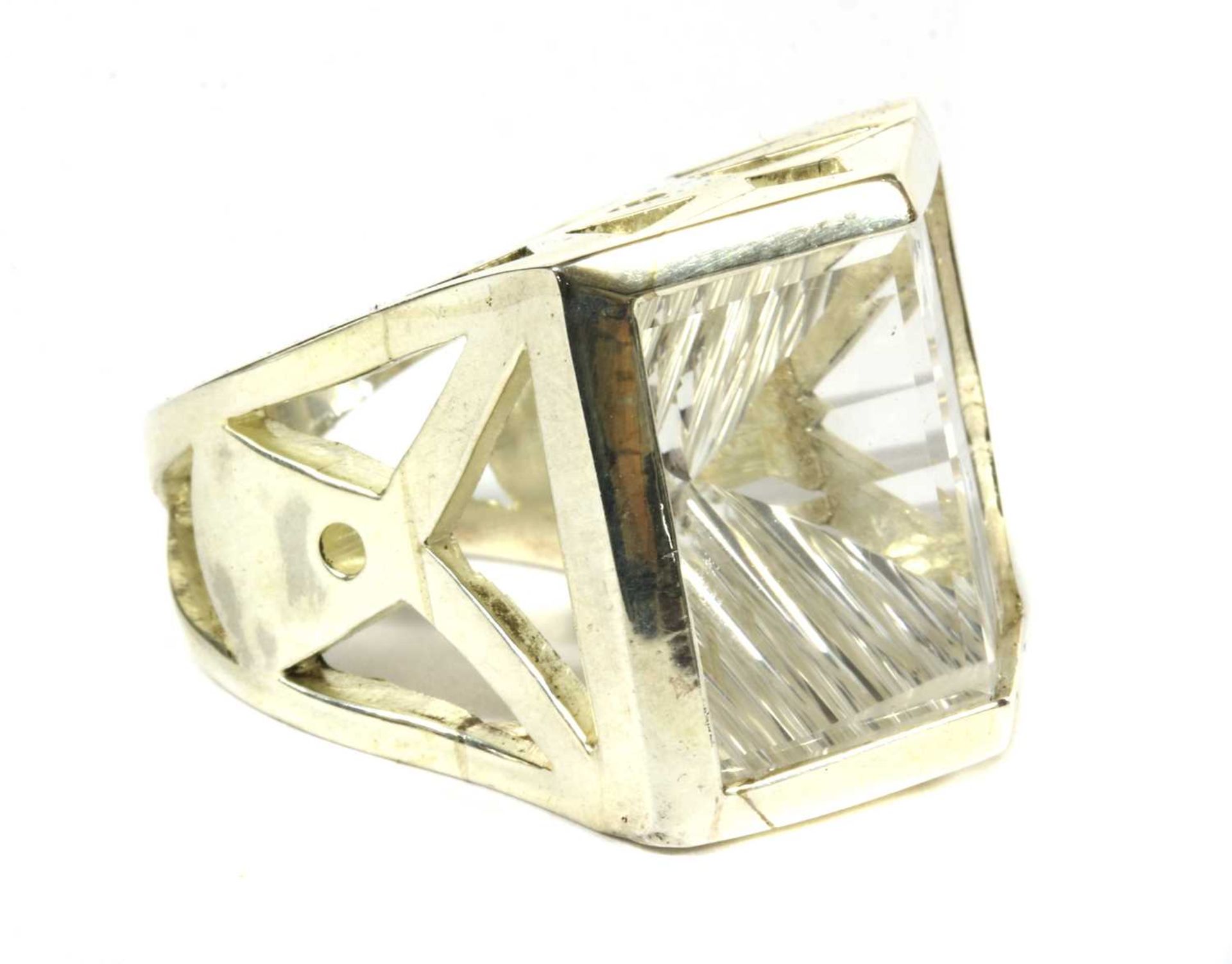 A silver single stone rock crystal quartz ring,
