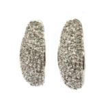 A pair of 9ct white gold diamond set 'J' hoop earrings,