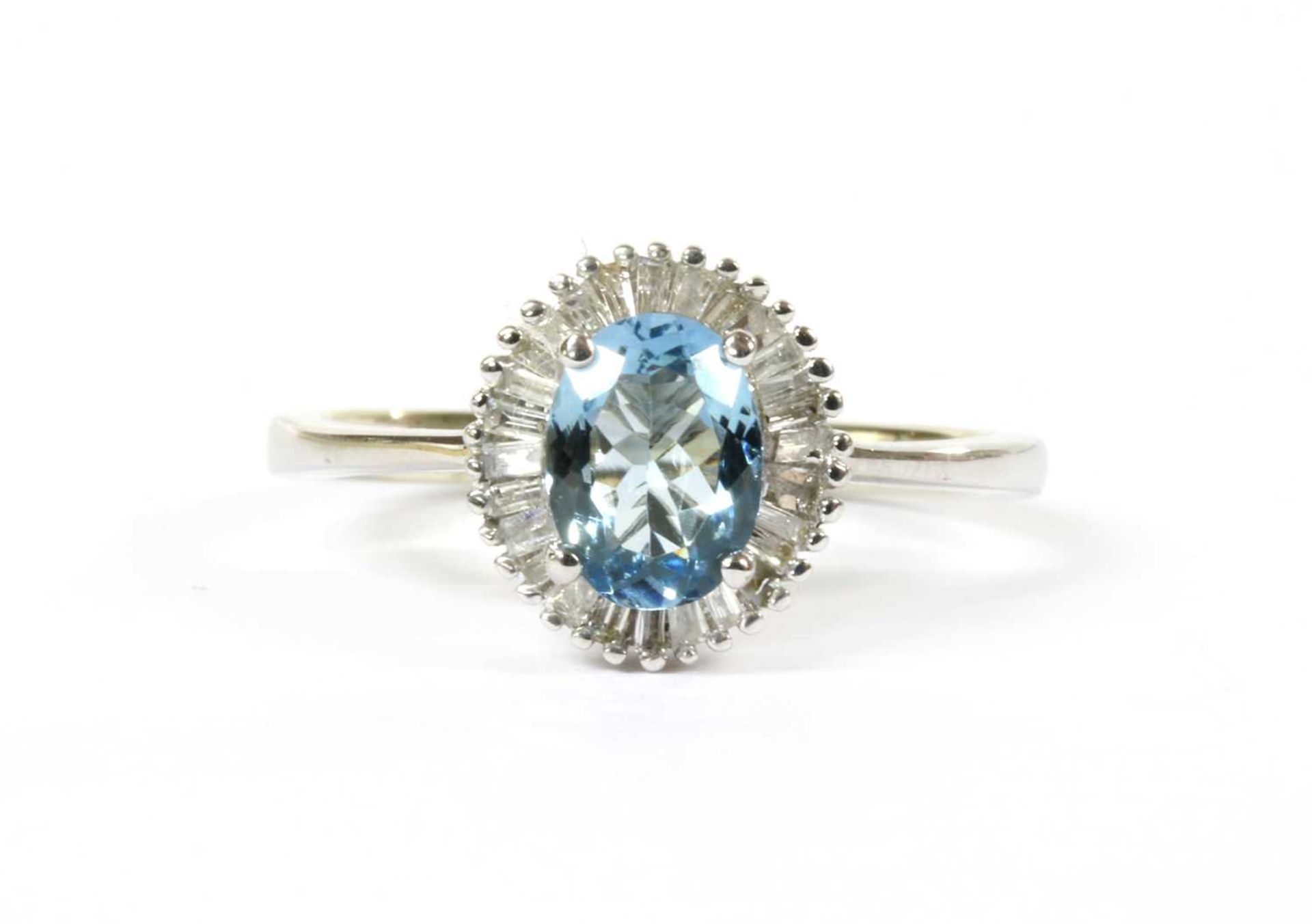 A white gold aquamarine and diamond cluster ring,