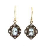 A pair of silver and gold, blue topaz and diamond drop earrings,