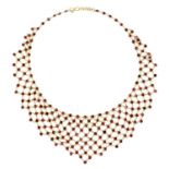 A gold ruby bib-style necklace,