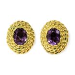 A pair of gold amethyst stud earrings,