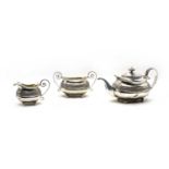 A Regency silver three piece tea service by Samuel Hennell, London,