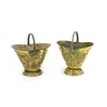 Two Victorian embossed brass coal scuttles,