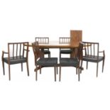 A rosewood extending dining table,