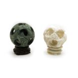 Two Chinese hard stone puzzle balls,