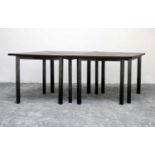 A set of four contemporary triangular tables,