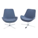 A pair of 'Evi' lounge chairs,