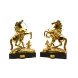 A pair of polished bronze Marley horses