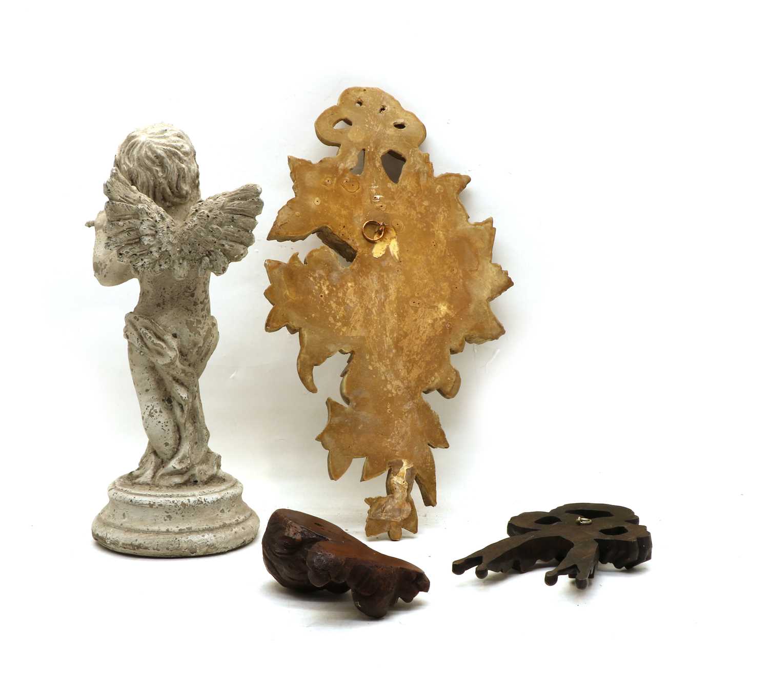 A carved and painted wooden figure of a cherub playing a flute, - Image 2 of 2