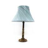A gilt metal and marble table lamp,