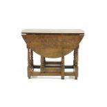 An oak gate leg table,