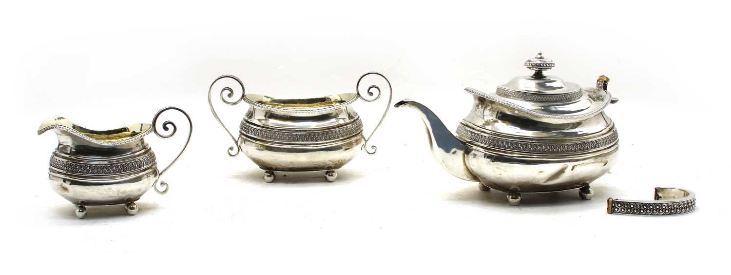 A Regency silver three piece tea service by Samuel Hennell, London, - Image 3 of 3