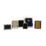 A collection of six silver and silver plated photograph frames,