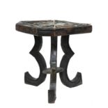 A carved and inlaid talismanic stool,