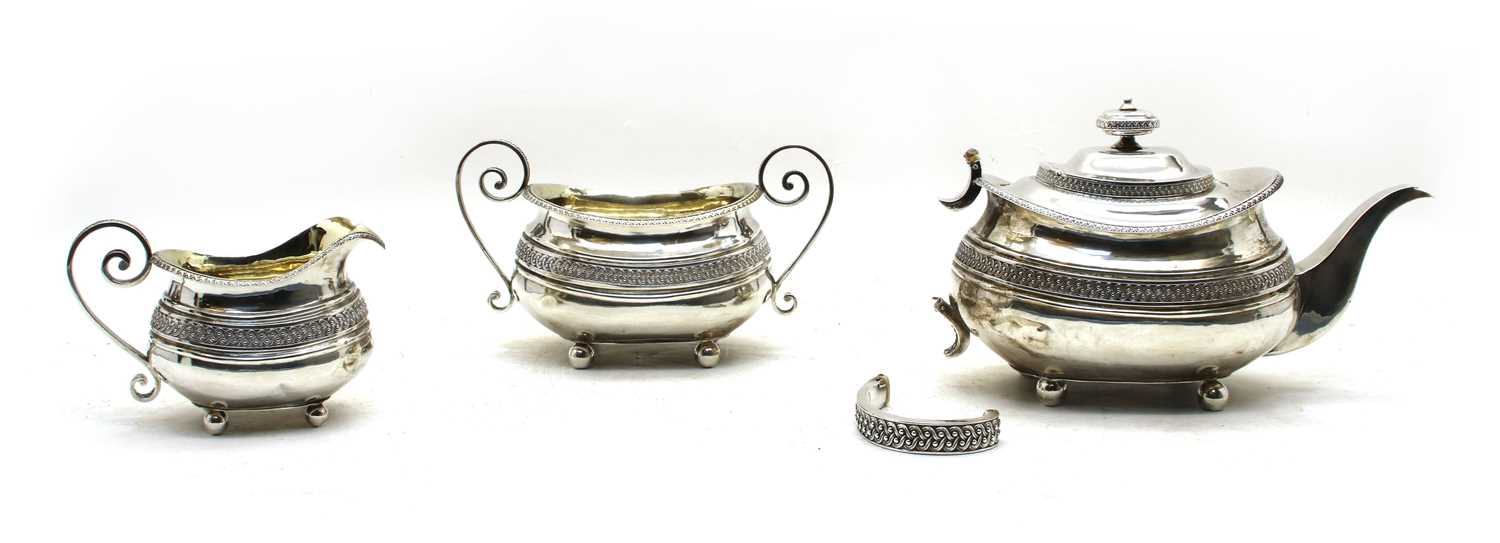 A Regency silver three piece tea service by Samuel Hennell, London, - Image 2 of 3