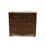 A small mahogany chest of two short and two long drawers,