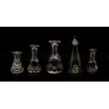 Four 19th century Scottish glass whisky measures and a bird feeder with frilled top,