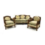 A 1930's bergere three piece suite
