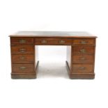 A mahogany pedestal desk