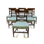 A set of six George III mahogany dining chairs