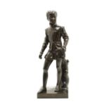 A bronze figure of a young boy in Elizabethan costume,