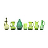 Ten pieces of green Mary Gregory glass,