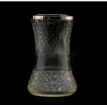 A moulded glass vase,