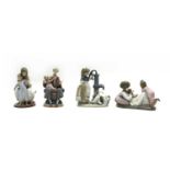 A collection of Lladro porcelain figures