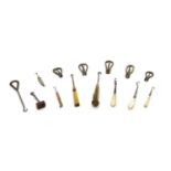 Approximately fifty shoe and glove button hooks