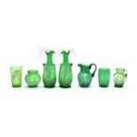 Six pieces of green 'Mary Gregory' glass ware,