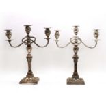 A pair of antique Sheffield plate candelabrum,