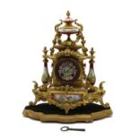 A 19th century French ormolu and porcelain mounted mantel clock,