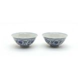 A pair of Chinese blue and white bowls,