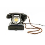 A 1960s GPO rotary dial telephone,